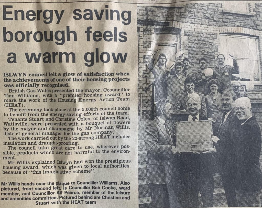 Newspaper clipping with headline 'Energy saving borough feels a warm glow'